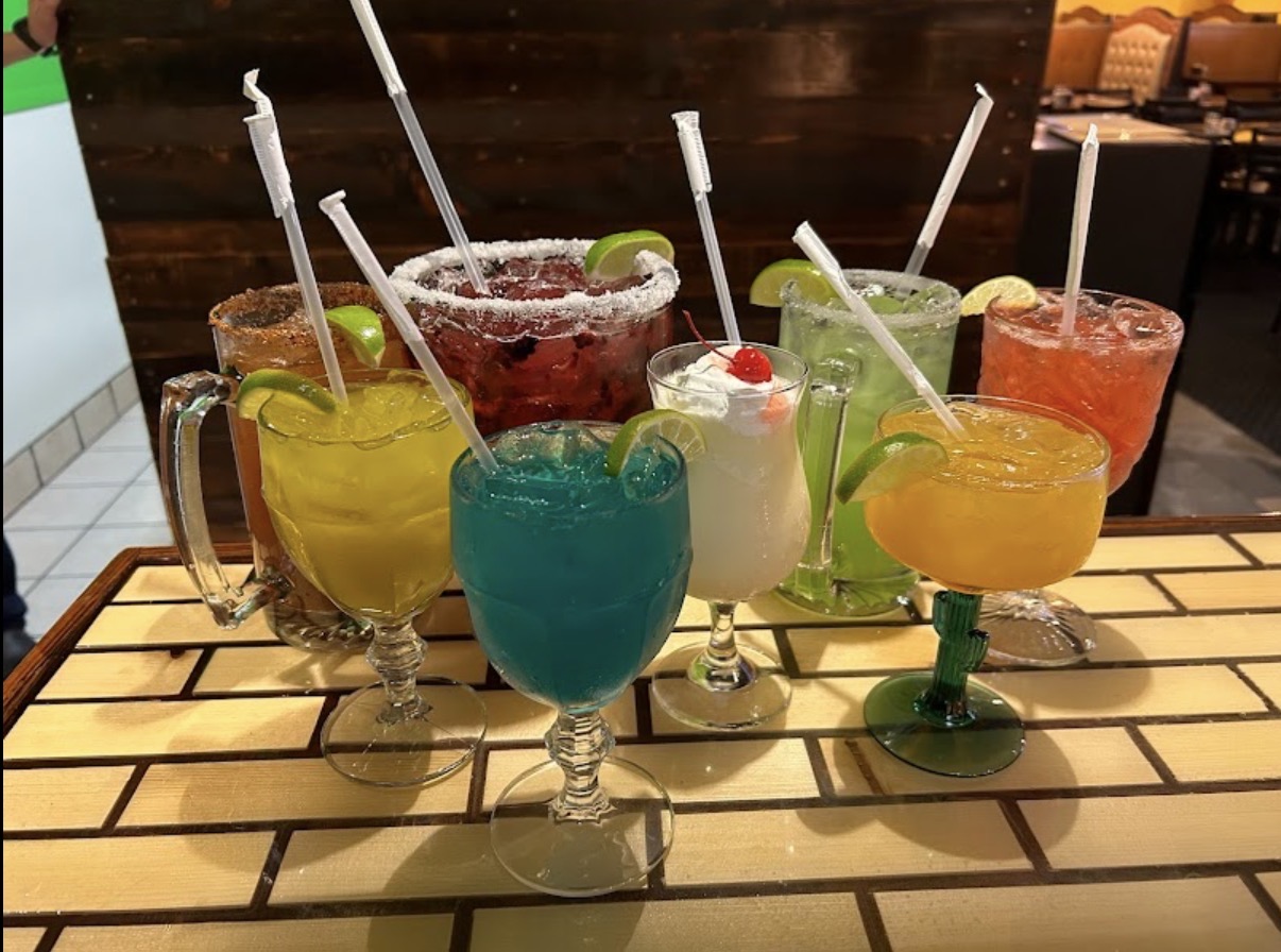 Colorful lineup of Monarcas margaritas and cocktails
